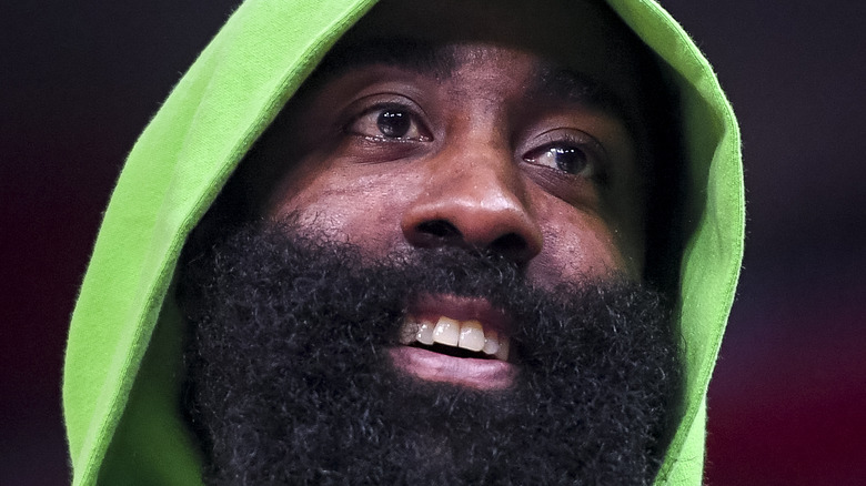 James Harden smiles slightly