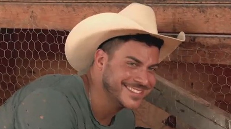 Jax Taylor poses at Brittany Cartwright's farm