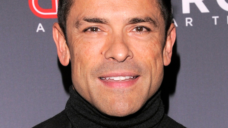 Mark Consuelos smiling on the red carpet