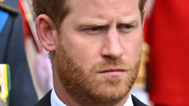 Prince Harry frowning at event