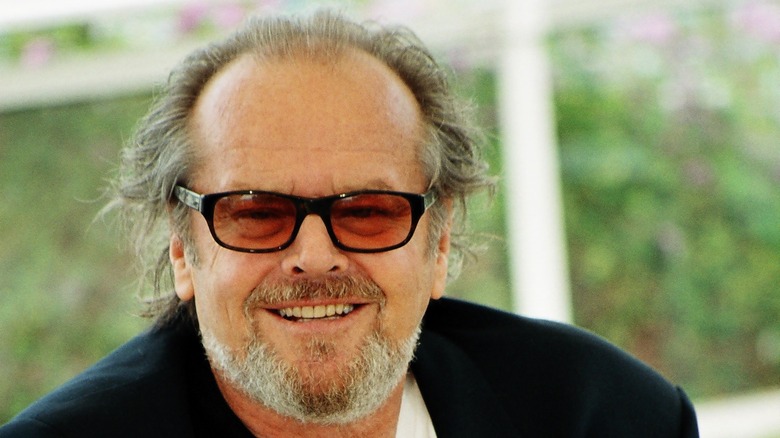 Jack Nicholson tinted glasses smiling