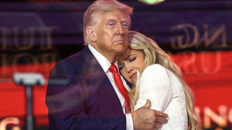 Donald Trump embracing Erika Kirk