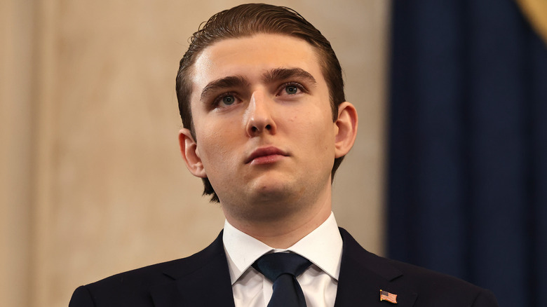 Barron Trump looking upward