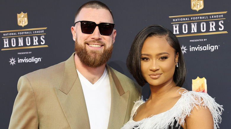 Travis Kelce, Kayla Nicole posing