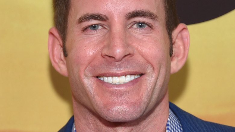 tarek el moussa smiling