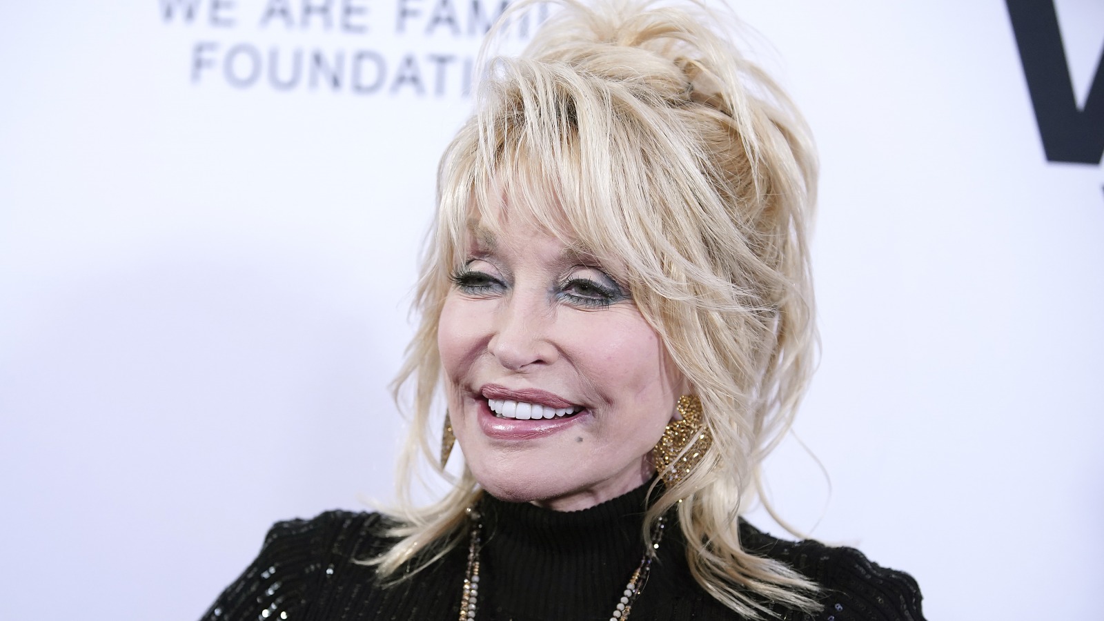 Dolly Parton has lots of little tattoos to hide her scars  BANG Showbiz  English