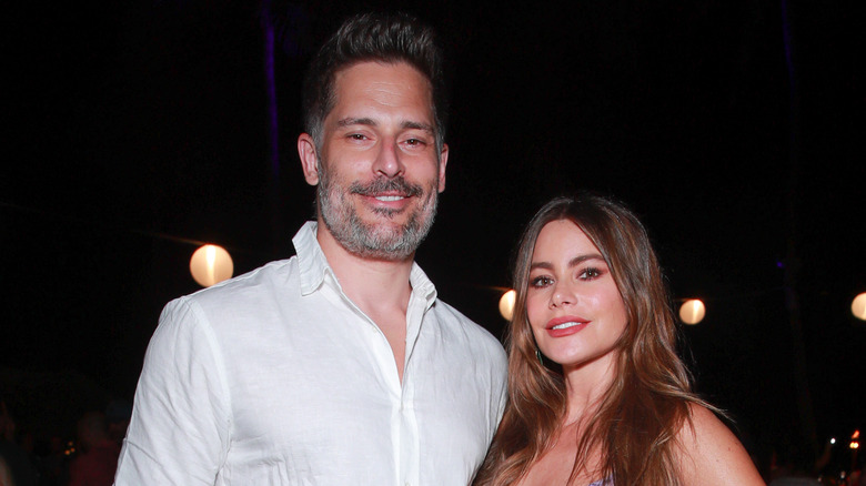 Joe Manganiello and Sofia Vergara smiling and posing together