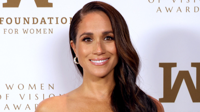 Meghan Markle posing in full glam