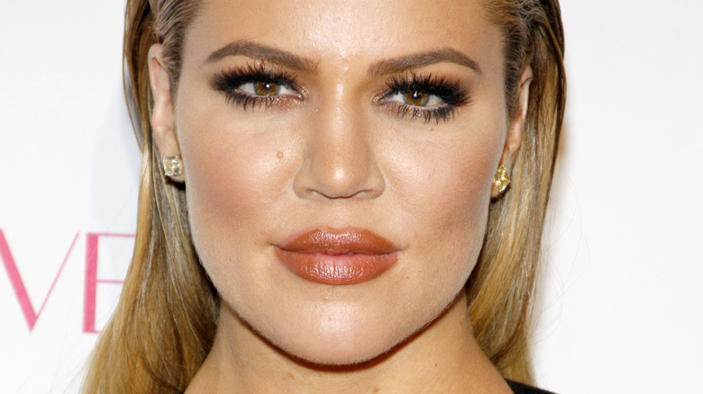 Khloé Kardashian smirking 