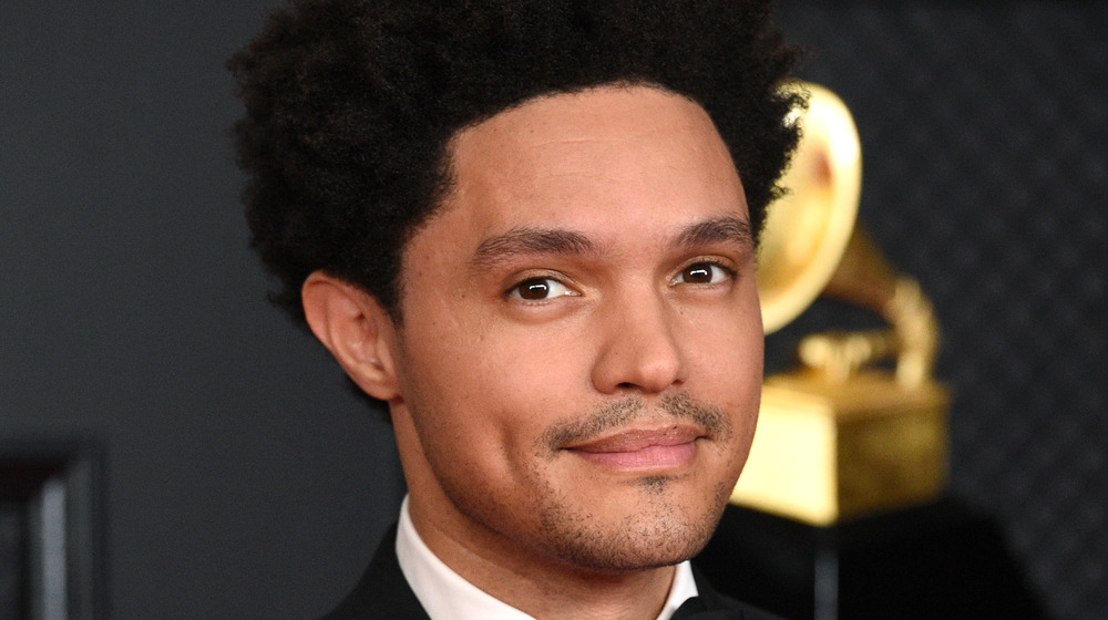 Host Trevor Noah posing at the 2021 Grammy Awards