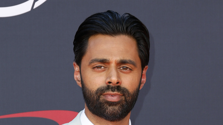 Hasan Minhaj posing