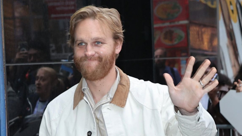 Wyatt Russell waving to fans