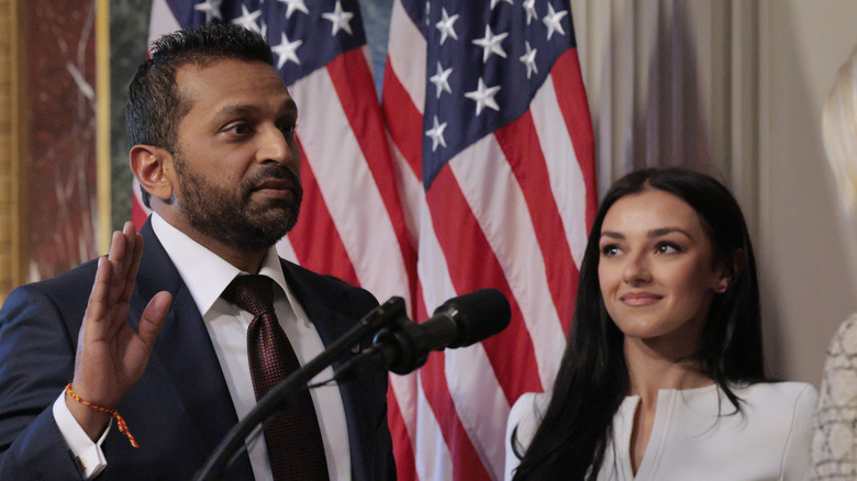 Alexis Wilkins stands next to Kash Patel at his swearing-in ceremony