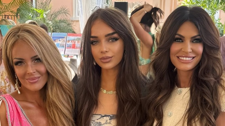 Gina Loudon, Lyda Loudon, and Kimberly Guilfoyle pose at Mar-a-Lago event