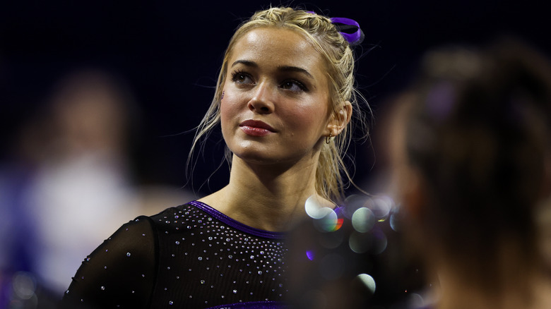 Livvy Dunne wearing black and purple