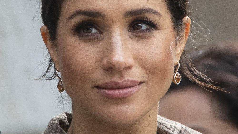 Meghan Markle gazing at Prince Harry