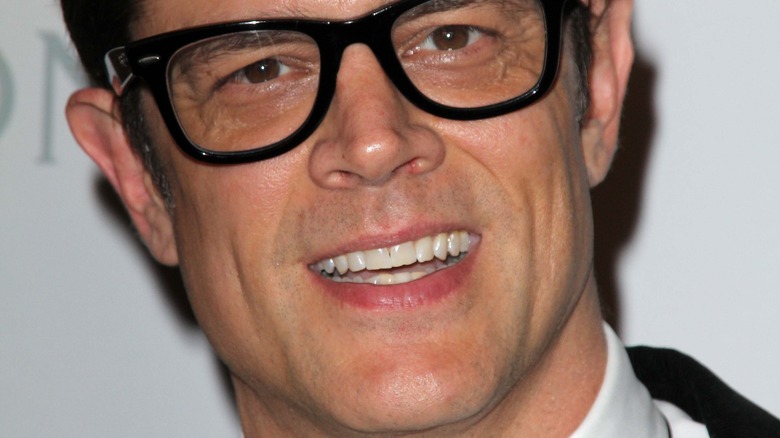 Johnny Knoxville smiles on the red carpet