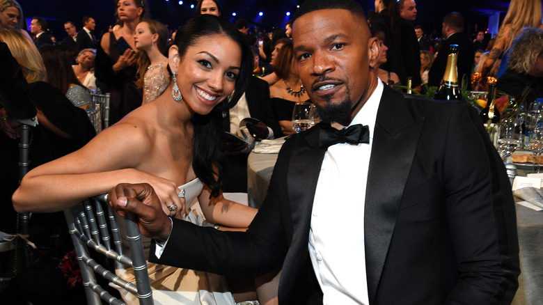 Corinne Foxx and Jamie Foxx smiling