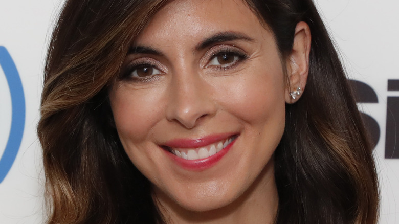 Jamie-Lynn Sigler smiles 