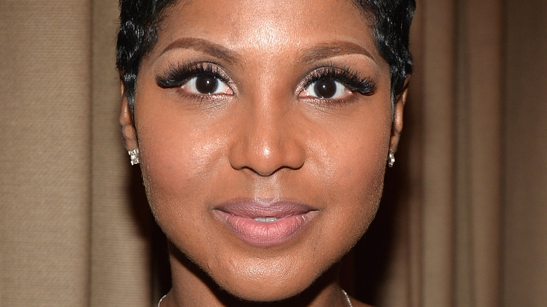 Toni Braxton posing for photo
