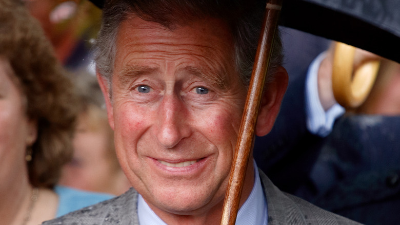 King Charles III smiling