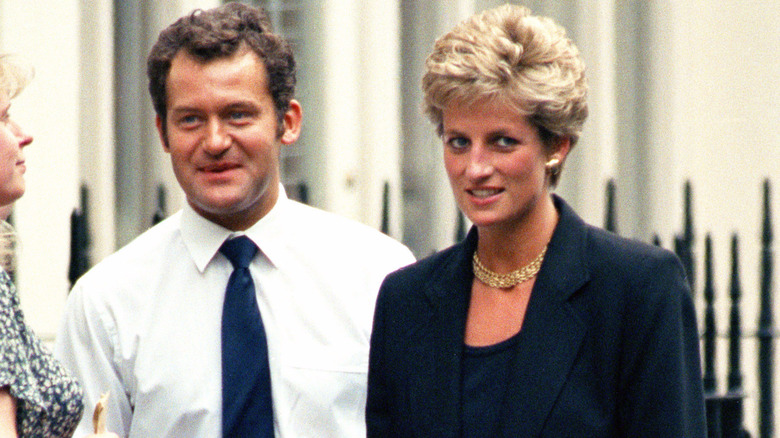 Paul Burrell behind Princess Diana smiling