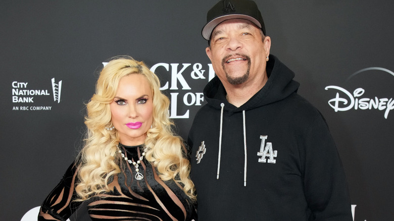 Coco Austin and Ice-T posing