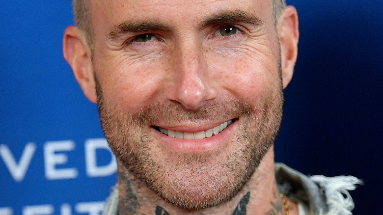 Adam Levine smiling