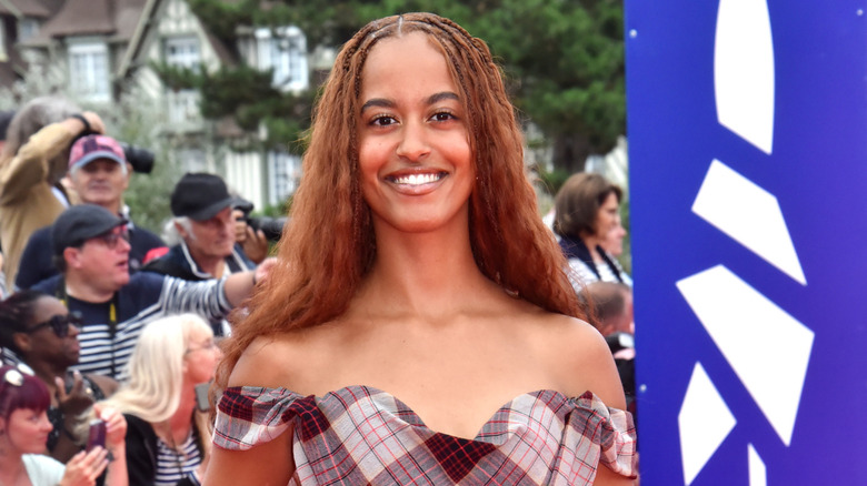 Malia Obama wearing checkered dress