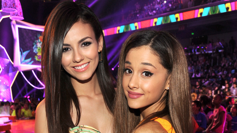 Actresses Victoria Justice (L) and Ariana Grande attend Nickelodeon's 27th Annual Kids' Choice Awards held at USC Galen Center on March 29, 2014.