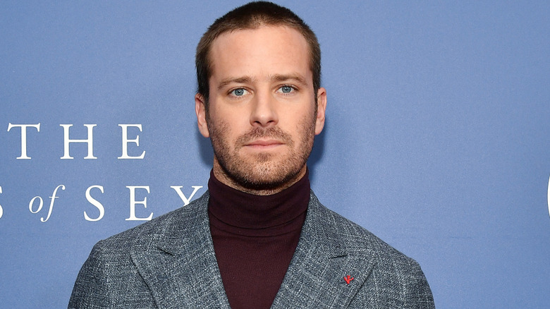 Armie Hammer looks serious at a 2018 screening