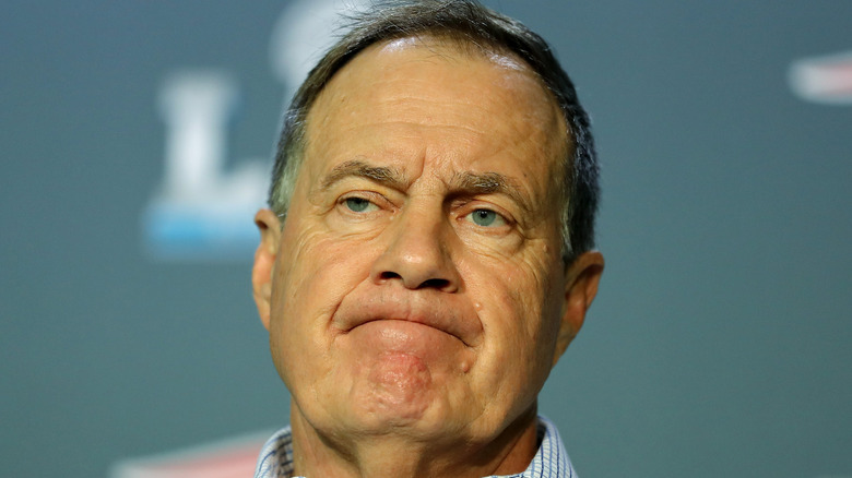 Bill Belichick pursing his lips