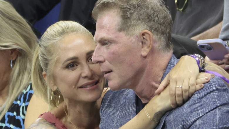 Brooke Williamson hugs Bobby Flay