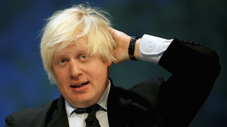 Young Boris Johnson looking embarrassed