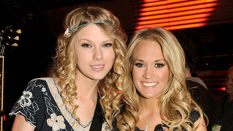Taylor Swift and Carrie Underwood smiling