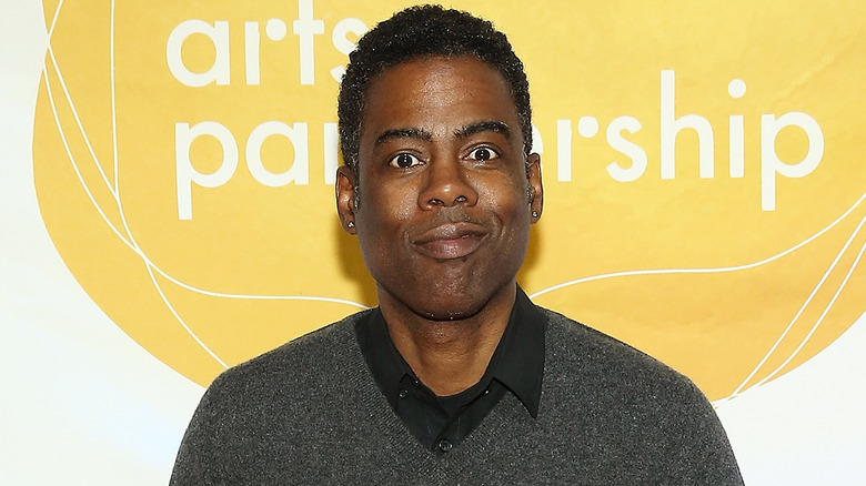 Chris Rock posing