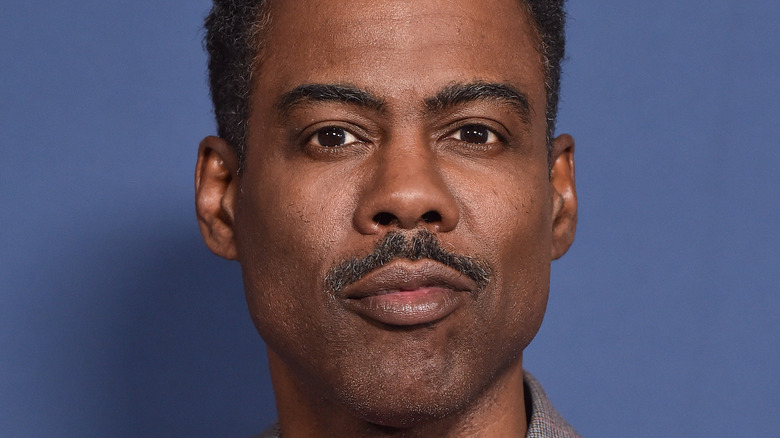 Chris Rock posing