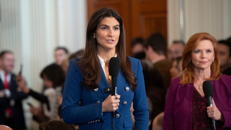 Kaitlan Collins speaking at a press conference at the White House