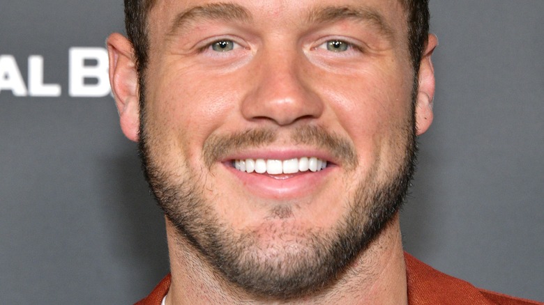 Colton Underwood, smiling, 2022 photo 