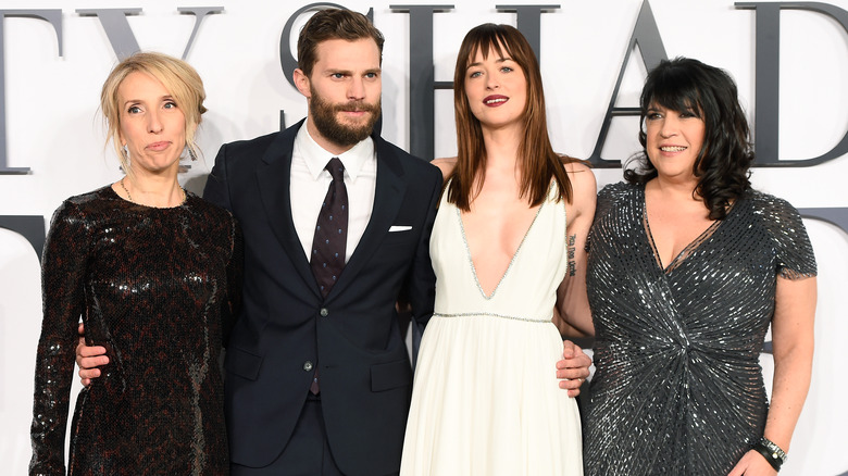 Sam Taylor-Johnson, Jamie Dornan, Dakota Johnson, E.L. James standing together