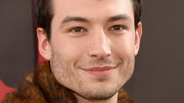 Ezra Miller grinning