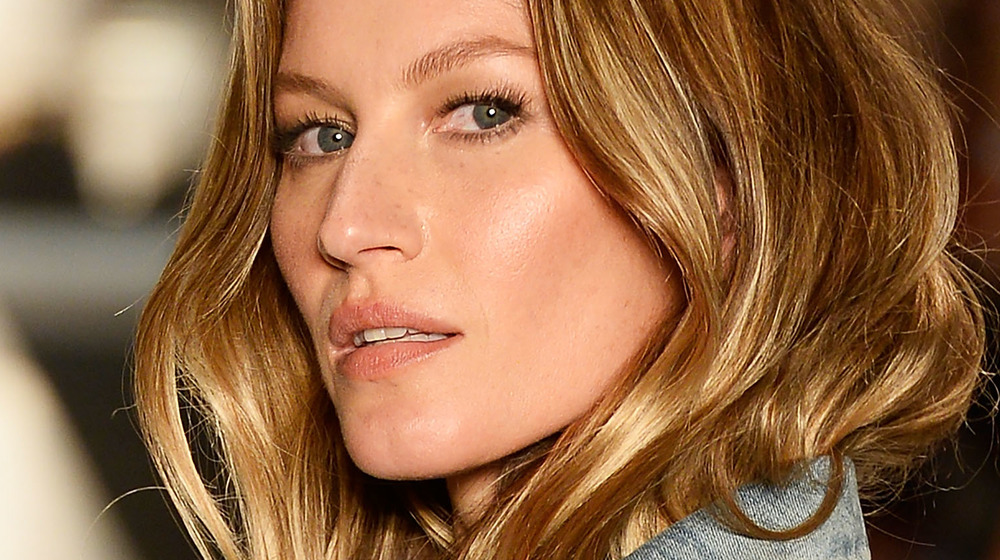 Gisele Bundchen casting a look to the side 