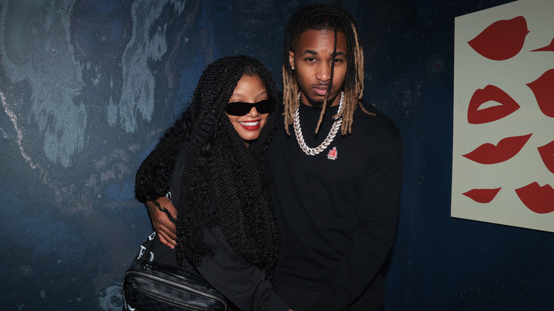 Halle Bailey and DDG wearing black