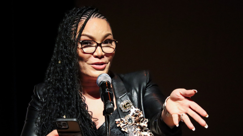 Egypt Sherrod speaking into a microphone at the BronzeLens Women Superstars Awards