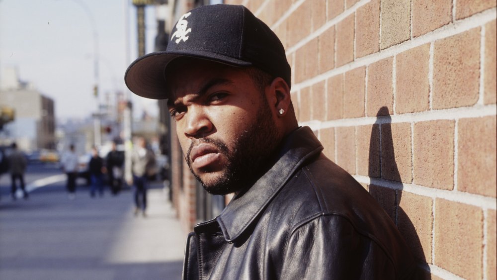 Ice Cube posing for a portrait in 1990
