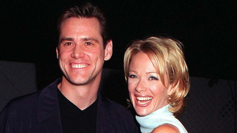 Jim Carrey and Lauren Holly smiling