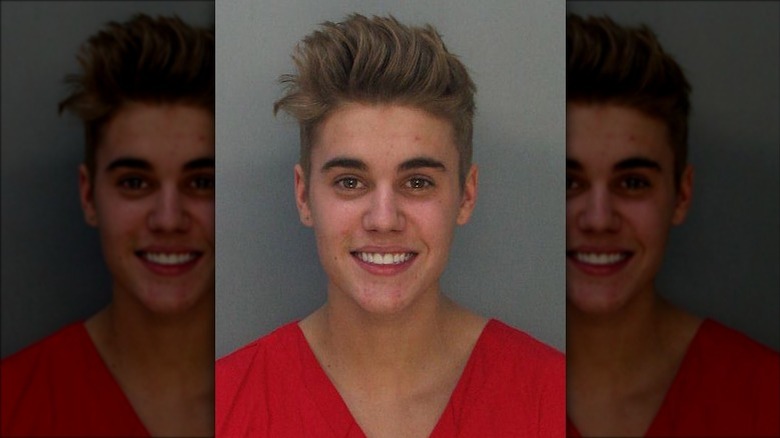 Justin Bieber smiling mugshot