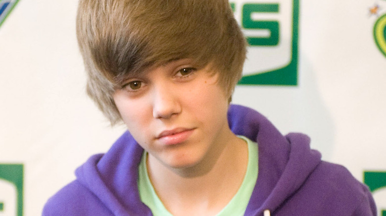 young Justin Bieber frowning 