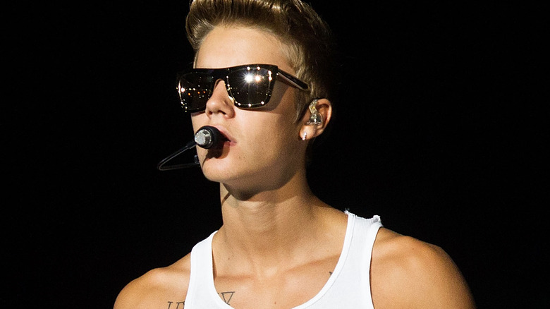 Justin Bieber posing on stage
