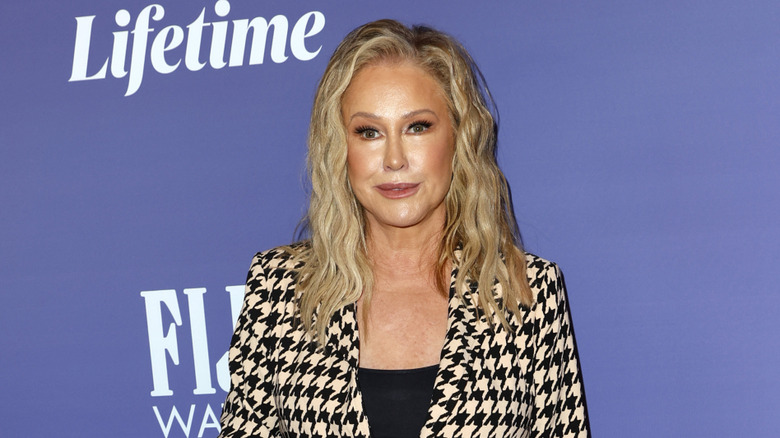 Kathy Hilton at an event, posing